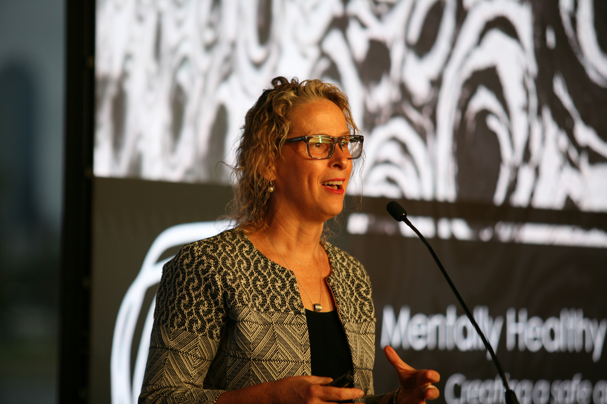 Margo Lydon, Keynote Mental Health Advisor talking to the guests at Talk at the Track, March 2023.